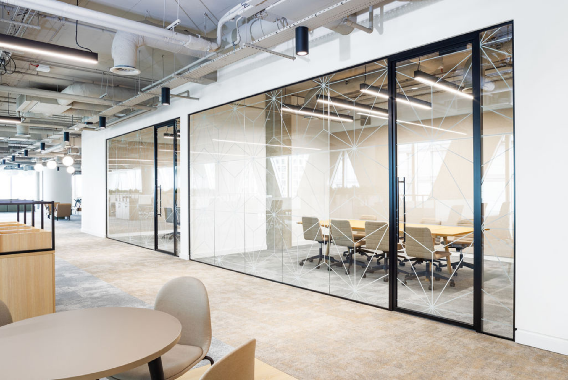 Office meeting rooms behind glass